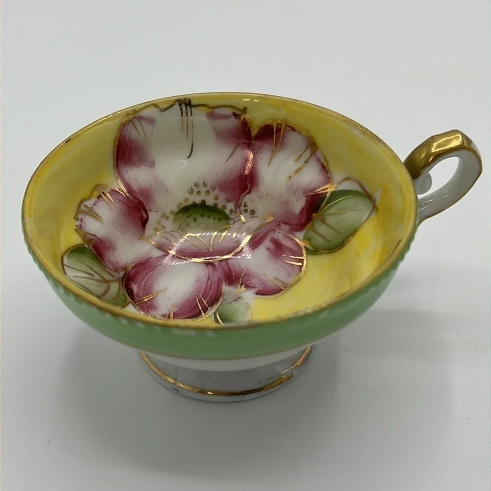 VINTAGE DAINTY LITTLE YELLOW AND PINK FLORAL TEACUP AND SAUCER